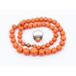 A Baltic coral graduated bead necklace, comprising round beads the largest approx 15mm the