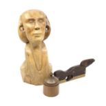A collection of treen items, including a vintage mahogany and brass wood plain, a carved sphinx