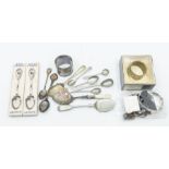 A collection of silver items to include a bangle, cufflinks, pendant, along with napkin ring,