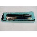 A Tiffany & Co silver pen; an Alfred Dunhill pen; and another (3)