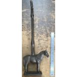 Cast iron horse door stop. Approximately 50cm high