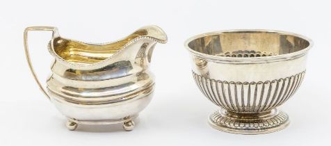 A late Victorian silver circular sugar bowl, gadroon lower section, hallmarked by John & William