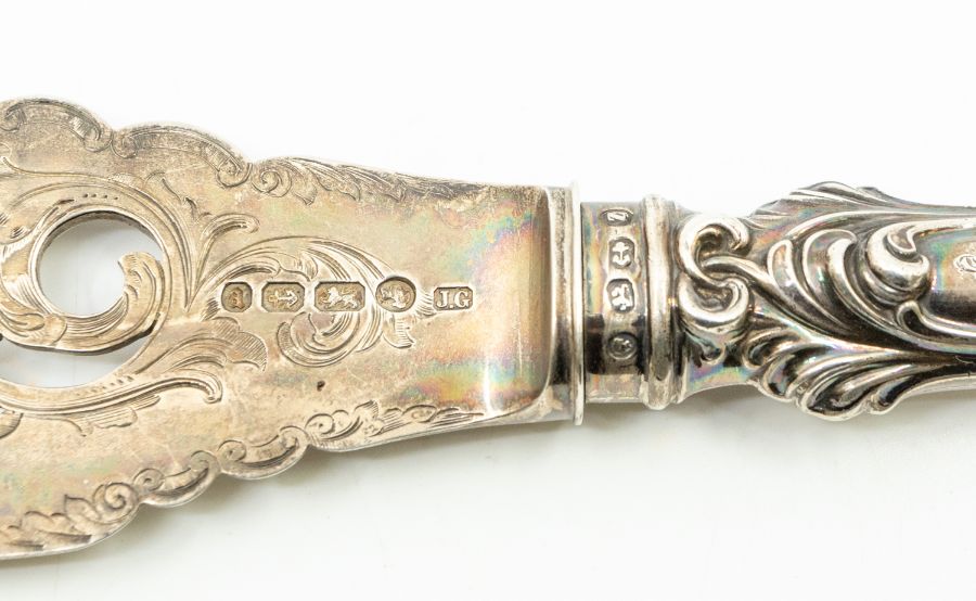 A pair of Victorian fish servers, the blade and tines engraved and pierced decoration, silver - Image 2 of 2