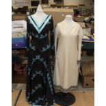 A 1970's Italian polyester maxi dress, by Travona; a German cream and black wool dress, by Ein