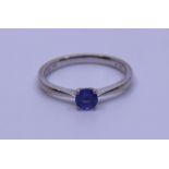 An 18ct white gold simple stone tanzanite ting, the round-cut tanzanite approx.0.33ct