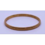 A 9ct gold Slave bangle 14g