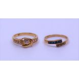 A 9ct crossover ring set cushion-cut sapphire and another dress ring stamped '18ct' (2)