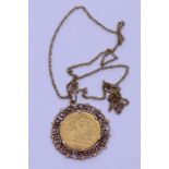 A George V and half sovereign dated 1914 in pierced pendant mount and suspended on five fancy link