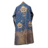 A Qing dynasty dragon robe, with gold wirework decoration , featuring a ferocious four clawed