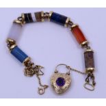 A 19th cent Scottish gold mounted polished stone bracelet