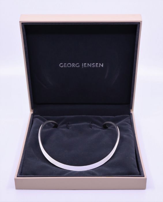 A Georg Jensen Danish sterling silver tongue necklace with flat turned out terminals, no A10A with