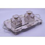 A large silver inkstand