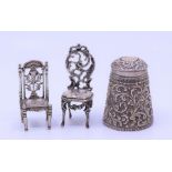 A collection of silver miniatures including Dutch chairs