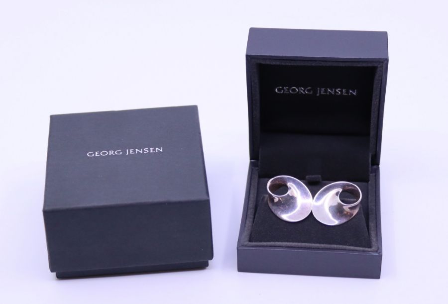 Pair of Georg Jensen Danish sterling silver earrings, Mobins pattern, stamped with no. 142 'Torun'