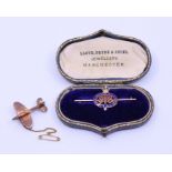 Two gold "sweetheart"brooches, militaria intrerest one in the form of a Spitfire