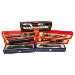 Seven assorted 00 gauge model railway coaches all boxed including Bachmann and Hornby.