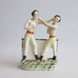 A Staffordshire figure of Heenan and Sayer. Pugh F figure 15 Circa: 1860 Size: 24cm H Condition: