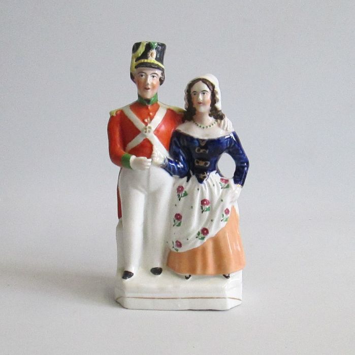 A Staffordshire figure of solider with his lady. Alpha factory Pugh C figure 261 Circa: 1854 Size: