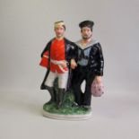 A Staffordshire figure of a soldier and a sailor arm in arm. River War group Pugh C figure 340