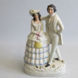 A Staffordshire figure of a lady and gentleman Circa: 1850 Size: 28cm H Condition: In good