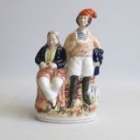 A Rare Staffordshire figure of Ham and Peggotty from Dickens “Copperfield” Pugh E figure 83 Circa: