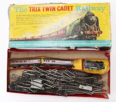 Trix: A boxed Trix Twin Cadet Railway, comprising: BR 0-4-0 Tank Locomotive, two coaches and a