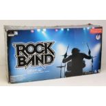 Video Games: A boxed Rock Band Drum Set, compatible with PlayStation 2 and PlayStation 3, contents