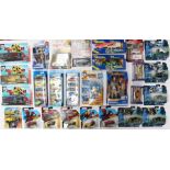 Diecast: A collection of assorted carded and boxed diecast to include: Tron Legacy; Majorette; Hot