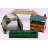 Railway: A collection of assorted model railway items to include: tinplate signal box, station,