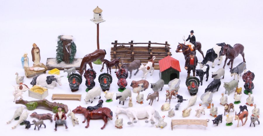 Britains: A collection of assorted lead and plastic figures to include various farm animals,