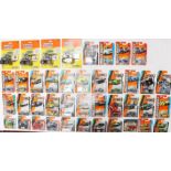 Matchbox: A collection of assorted carded Matchbox diecast vehicles to include: Monster Wars, Heroic