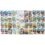 Hot Wheels: A collection of approximately 60 Hot Wheels long card vehicles to include: Showroom,