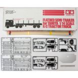 Tamiya: A boxed Tamiya Flatbed Semi-Trailer, 56306, contents appear unused but incomplete;