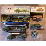 Diecast: A collection of assorted diecast vehicles to include Dinky Military vehicles. In playworn