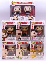 Funko: A collection of six Funko Pop! WWE boxed figures to comprise: Mick Foley 35, The Rock 46,