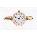 Rolex- a ladies early 20th Century 9ct gold cased Rolex wristwatch, white enamel dial with painted