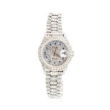Rolex - a ladies Rolex DateJust diamond and sapphire set 18ct white gold wristwatch, round dial