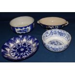 4 pieces of blue and white pottery to include 3 bowls and a vegetable dish  94) Condition , chips to