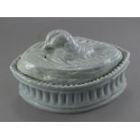 French Faience game tureen mid 19th C , modelled with a game bird on the cover , 23 cm in length
