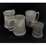 Four pewter tankards, of differing sizes