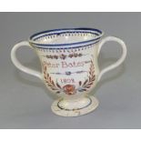 Staffordshire copy of an earlier two handled frog loving cup , named Peter Bates and dated 1802 ,