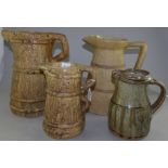2 Hillstonia jugs 28 cm and 19.5 cm high , a large Scottish Dundee jug 26.5 cm and an unmarked