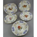 Staffordshire part dessert service circa 1825 . With lilac sprig moulded grapevine border and hand