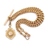 Football interest: A 9ct gold double Albert link chain, swivel clasps and T bar, length approx 16'',