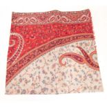 A red paisley shawl