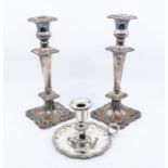 A pair of early 20th Century silver plated candlesticks, along with early 20th Century silver plated
