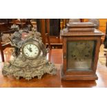 Late 19th Century oak cased eight day mantle clock with brass face, Roman numerals along with