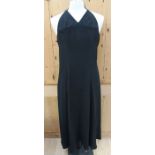 An Ossie Clarke for Radley, black crepe halterneck maxi dress, size 12; a Gordon King viscose floral