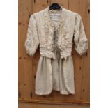 An Edwardian jacket, circa 1910-1912, herringbone wool, pin tuck, scroll work braiding, inner silk