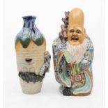 Chinese figure of a God or immortal of Happiness, along with a Japanese vase, studio style pottery